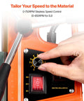 Magnetic drill press with orange housing and black control panel featuring a yellow speed dial knob