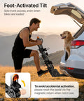 Man demonstrating Heavy Duty 4 Bike Hitch Rack For Cars Trucks And SUVs With 2 Inch Receiver Foldable And Tiltable Design with dog nearby