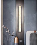 Modern LED Wall Sconce Dropping Chill Ambient Glow With 3000K Up And Down Illumination Top Shelf Build for bedroom decor.
