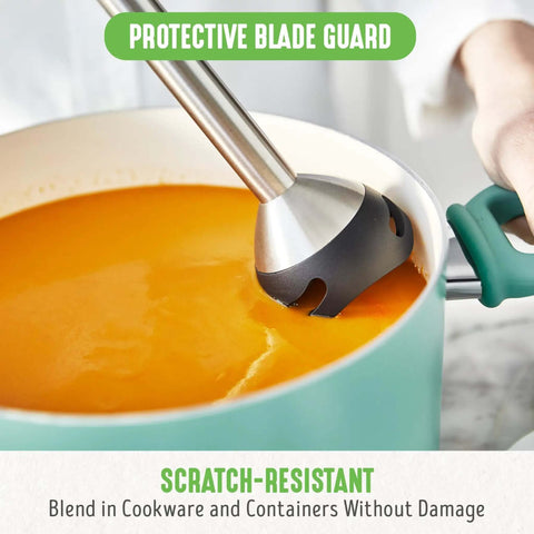 No Sweat 500 Watt Immersion Hand Blender With Knockout Stainless Steel Blades blending soup in a pot with protective blade guard.