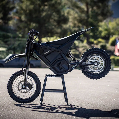 IN10 Electric Dirt Bike With 2600W Peak Motor, 40 MPH Top Speed, 48V 23Ah Battery, Full Hydraulic Brakes And Suspension, Off Road Mountain Ebike For Teens And Adults, Ready To Rip Trails, black side view on stand