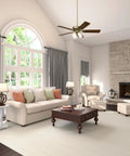 Living room with Studio Series 52-Inch Indoor Ceiling Fan With New Bronze Finish, Lit LED Light Kit, and Pull Chains.