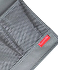 Slide Under Mattress Bedside Storage Caddy With Sturdy Oxford Cloth And Leather Trim showing grey mesh pockets and logo.