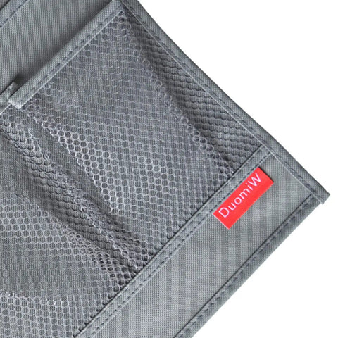 Slide Under Mattress Bedside Storage Caddy With Sturdy Oxford Cloth And Leather Trim showing grey mesh pockets and logo.