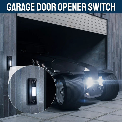 Garage door opener switch mounted on stone wall beside open garage, black metal button with white LED light