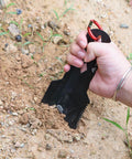 Person using Ultralight Backpacking Trowel With Longer Handle Aluminum Camping Shovel For Hiking Outdoor Travel And Survival