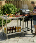 Stainless Steel Workbench With Dual Tier Storage Rack, 31.5 By 20 Inches, Heavy Duty Prep Table in barbecue area with grill