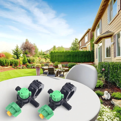 2 Pack Fan Shaped Misting Nozzles for Farm Irrigation on table with garden view