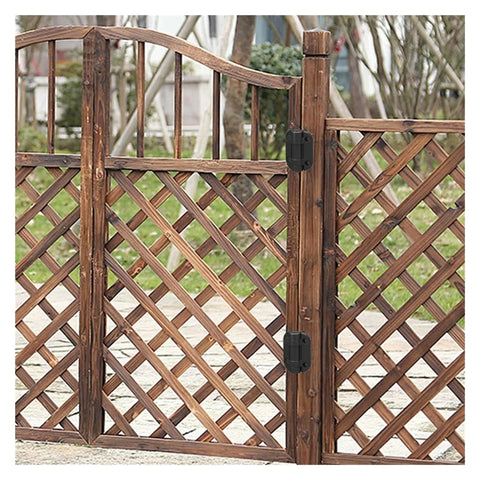 Two black torque-damping hinges mounted on a wooden lattice garden gate