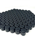 One Hundred Pack Black Rubber Folding Chair Leg Caps For Seven Eighth Inch Tubular Frames Non Marring Floor Savers visible in bulk.