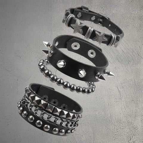 Set Of Four Badass Punk Studded Leather Bracelets For Men And Women Adjustable Spike Rock Goth Emo Y2K Grunge Wrist Cuffs on display.
