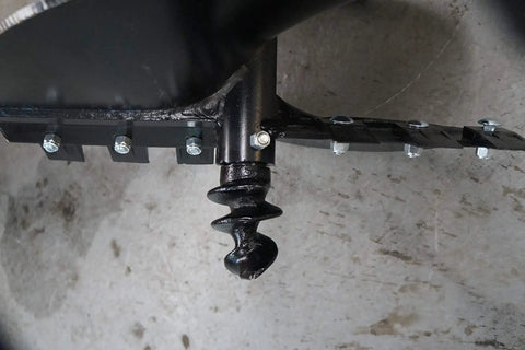 Close-up of Beefy 24 Inch Earth Auger With 2 Inch Round Drive And Replaceable Cutting Edges, showing bolt-on pilot tip