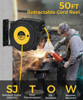 Heavy Duty Retractable Extension Cord Reel 50 Feet Long With Rugged 14 AWG Wiring And Three Bright Lighted Outlets in use at a jobsite.