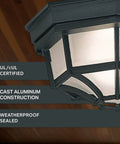 Close-up of Builder Cast Outdoor Flush Mount Ceiling Light Black 10.5 Inch Wide With Frosted Glass showing cast aluminum design