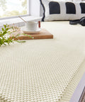 Custom Fit Fireplace Hearth Pad Big Time Ultra Snug Corduroy Baby Proof Buffer Bumper Non Slip Window Seat Cover on a window seat.