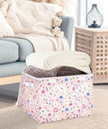 Heavy Duty Foldable Storage Bin With Secure Flip Top Lid And Collapsible Build For Bedroom Essentials holding three rolled blankets.