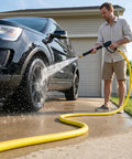 Man using Yellow Short Garden Hose 3/4 Inch By 10 Feet No Kink Leak Free Flexible PVC Water Hose to wash car