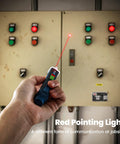 Hand holding Non Contact Voltage Tester With Alarm And Flashlight LCD Display Dual Range Sniffer in front of control panel