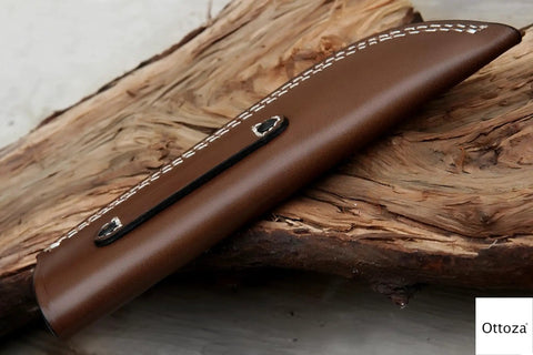 Top Grain Leather Knife Sheath For Fixed Blade Knives Built To Last Belt Carry Holster Vertical Knife Holder For 6 Inch Blades Up To 1.5 Inch Wide Handcrafted Cowhide Everyday Carry EDC Gear displayed on wood