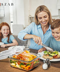 Family dining with Beast Mode Massive 2700ml Glass Storage Container with lids for roasting and leftovers on the table.