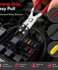 Four Piece Relay And Fuse Puller Set For Tight Spaces with red handle relay puller shown removing fuse from box.