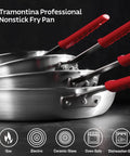 Heavy Duty 12 Inch Nonstick Frying Pan With Slick Release Coating Built Like A Tank stacked with red handles, showcasing durability and versatility.