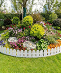 Colorful garden surrounded by 66 Feet Long Five Point Five Inch High Landscape Edging Border With 100 Spikes Flexible Plastic No Dig For Flower Beds Lawn Yard And Pathway White Durable Garden Edging Kit Easy Install.
