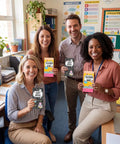 Group of four teachers holding Two Pack Teacher Sticky Notes Gift Set With 560 Self Adhesive Notepads in a classroom setting.