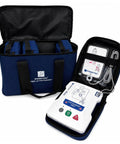 Premium AED Simulator Kit Four Pack Heavy Duty Defibrillator Practice Devices in blue carrying case for training.