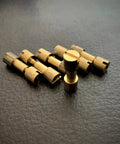 Knife Handle Making Brass Corby Bolts Pack of 6 for EDC DIY Builds All Brass Pivot Pin Rivets and Screws Kit on leather surface