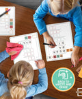 Students using Long Division Practice Dope Dry Erase Sheets 11x14 Reusable Math Manipulatives for Classroom Centers 5th Grade