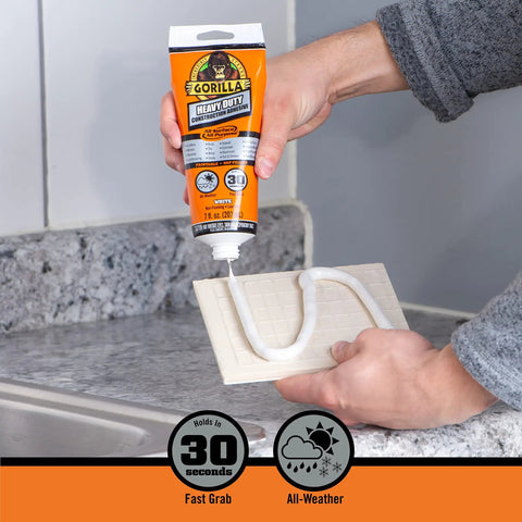 Person using Heavy Duty Construction Adhesive White Glue 7 Ounce Squeeze Tube Tough As Nails For Indoor And Outdoor Projects Waterproof.