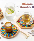 Ultimate Mosaic DIY Kit for Adults, Mixed Color Stained Glass Tiles With Two Wooden Coaster Bases displayed with tea and candle