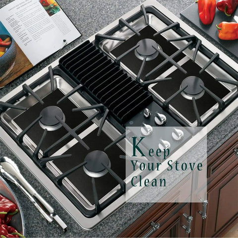 Top view of reusable gas stove burner covers ten pack nonstick stovetop liners and gas range protectors on a gas range
