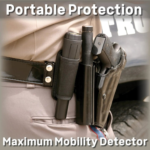 Officer with Metal Detector With 360 Degree Detection, Four Inch Sensor in belt, showcasing portable use
