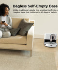 Matrix Clean Robot Vacuum With Serious Suction For Pet Hair On Carpets And Hard Floors Self Empty Base next to sofa