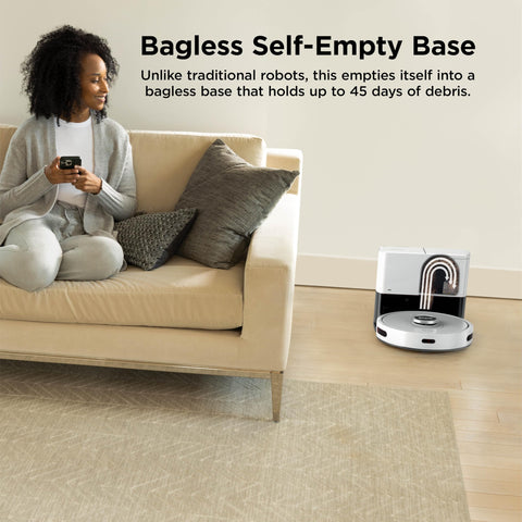 Matrix Clean Robot Vacuum With Serious Suction For Pet Hair On Carpets And Hard Floors Self Empty Base next to sofa