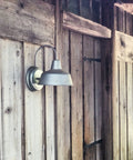 Gooseneck Barn Light Mason Farmhouse Outdoor Wall Sconce for Porch and Patio in galvanized gray on rustic wood wall.