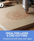 Baltic birch plywood sheet being laser-cut by a CNC head; intricate circular mandala pattern engraving.