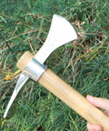 Hand holding 2 In 1 Gardening Pick Axes With Stainless Steel Double Headed Mattock And Wooden Handle Ergonomic Grip for garden work