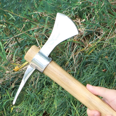 Hand holding 2 In 1 Gardening Pick Axes With Stainless Steel Double Headed Mattock And Wooden Handle Ergonomic Grip for garden work