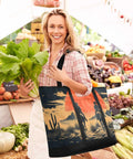 Woman holding lettuce and Western Desert Cowboy Insulated Cooler Bag Reusable Thermal Tote with Big Capacity for Shopping Picnics Beach Trips Travel and Camping Leak Proof Lunch Box Triple Layer Insulation Keeps Food Cold or Hot All Day at market