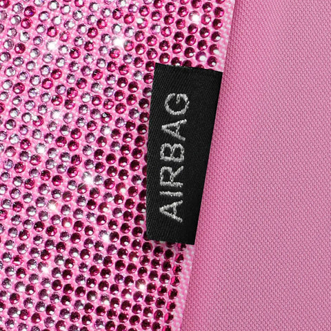 Close-up of Blinged Out Pink Leather Car Seat Covers Full Set Waterproof Glitter Crystal Rhinestone Sparkle with airbag label