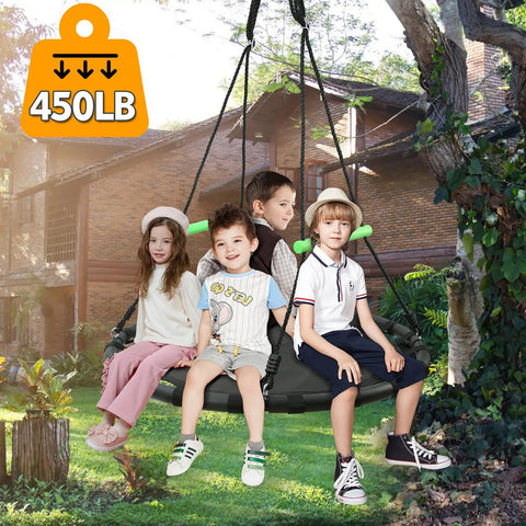 Children playing on a Black Round Saucer Swing With Handles For Backyard Fun, Built Tough Steel Frame, 40 Inch Diameter, Durable PP Mat