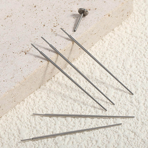 Six Pack 20G Piercing Taper Insertion Tool Set For Flat Back Earrings shown on a textured surface, highlighting stainless steel material and precise tips.