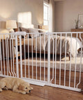 Extra Wide Walk Through Baby Gate With Door 67 To 71.5 Inch Wide Pressure Mounted No Drill Metal Auto Close Gate in a bedroom setting.