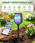 Person using smartphone app with 8-In-1 Smart Soil Tester With App Monitoring For Garden, Lawns, Farms And Indoor Outdoor Plants Real-Time Readouts Of Moisture, pH, Temperature, Light Intensity, Salinity, Fertility, EC And Humidity in a garden.