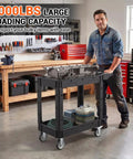 Beefy Rolling Storage Cart 40 By 17 Inches With 1000 Lb Capacity, Workhorse Utility Cart Made From Industrial Grade Polypropylene, Rustproof, Waterproof, Corrosion Resistant For Indoor Or Outdoor Use in a workshop with engine block