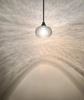 2 Pack 7.7 Inch Black Brownish Grey Seeded Glass Pendant Lights For Kitchen Island And Dining Area Over Sink glowing softly
