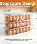 Stacked Clear Stackable Egg Holder With Lid And Handle Pack Of 4 For Fridge Organization 14 Slot Egg Tray on kitchen counter